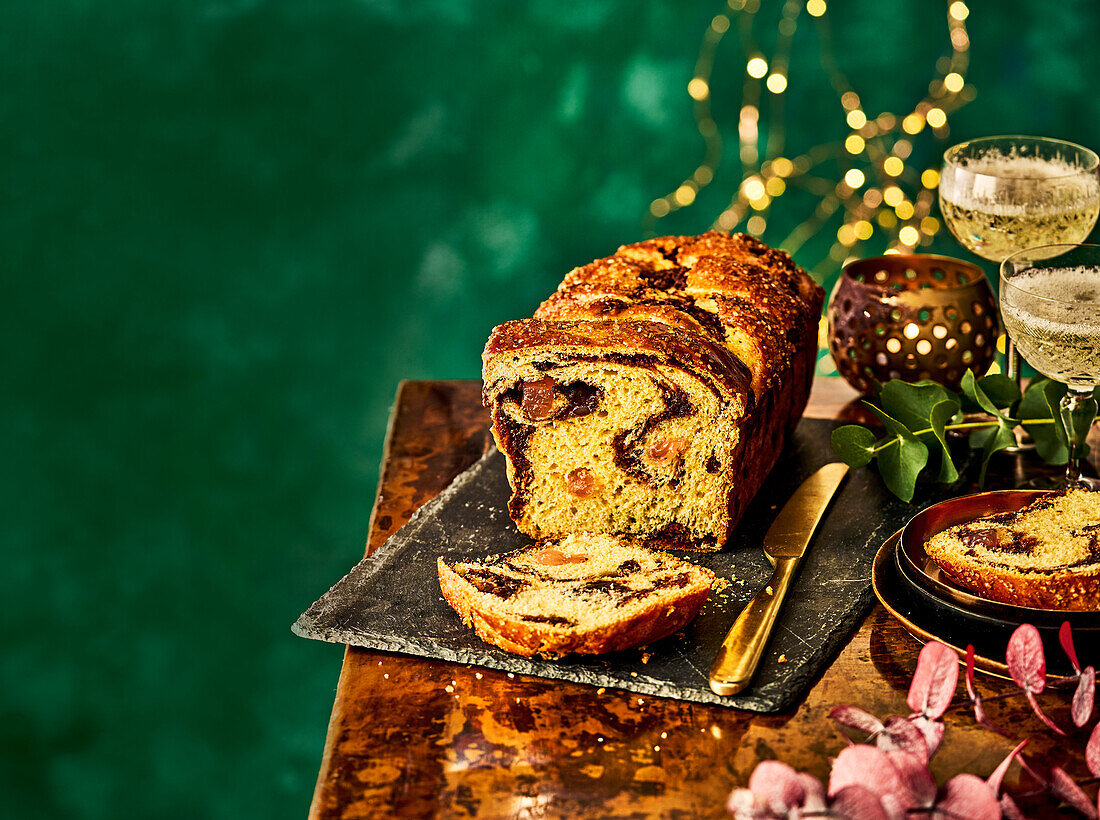 Cozonac (Christmas bread with golden raisins, nuts, and chocolate)