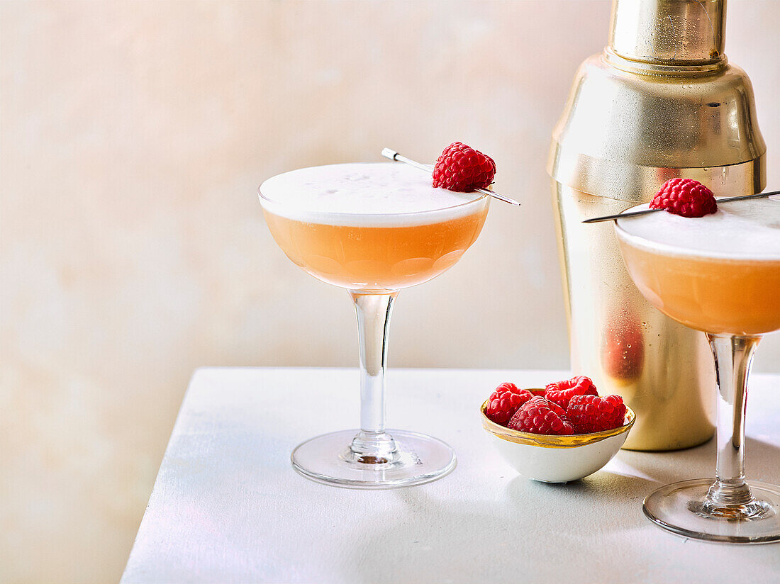 French Martini with raspberry skewers