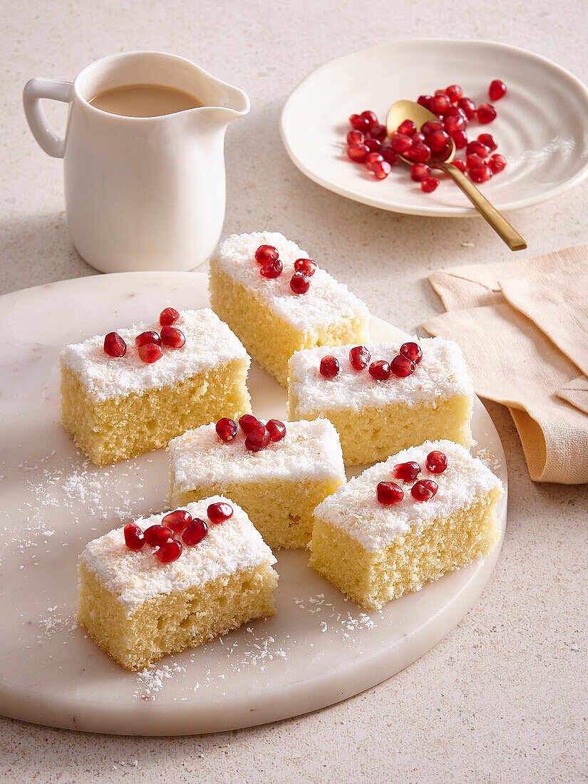 Coconut cake with pomegranate seeds