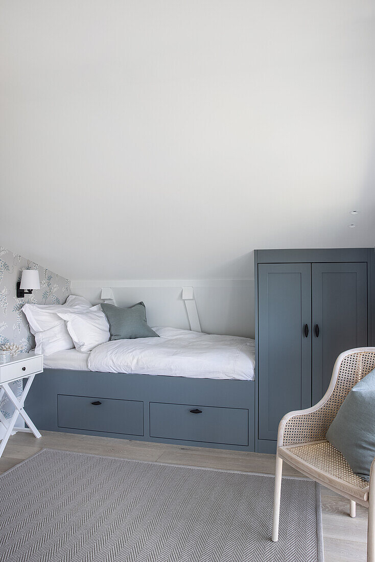 Wardrobe and matching bed in the attic room