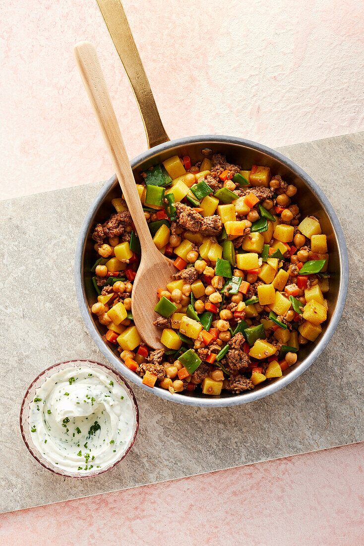 Potato-and-chickpea hash with minced meat and chive quark