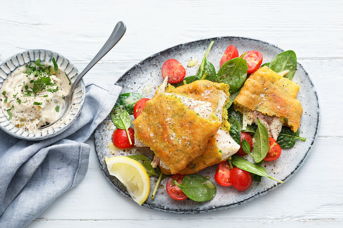 Renken-Backfisch auf Spinat-Tomaten-Salat