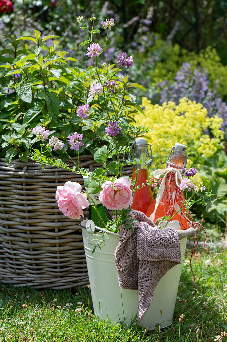 Drinks bottles in buckets for summer party in the garden