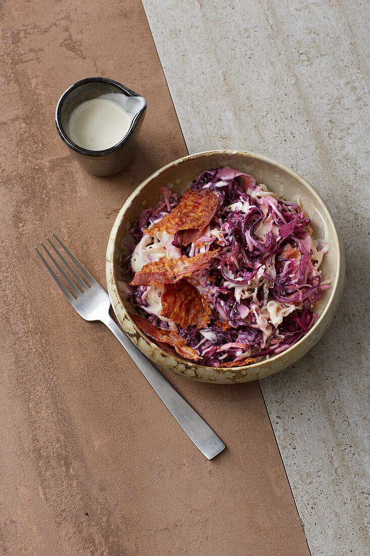 Red and white coleslaw with bacon