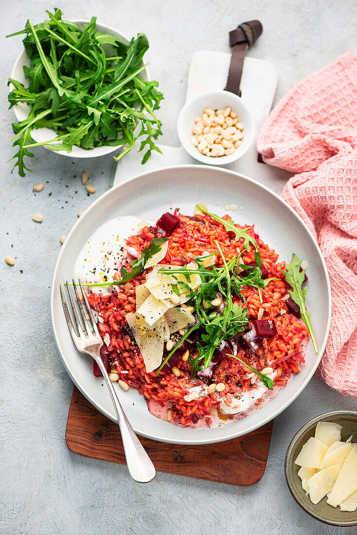 Beetroot risotto with rocket and parmesan cheese