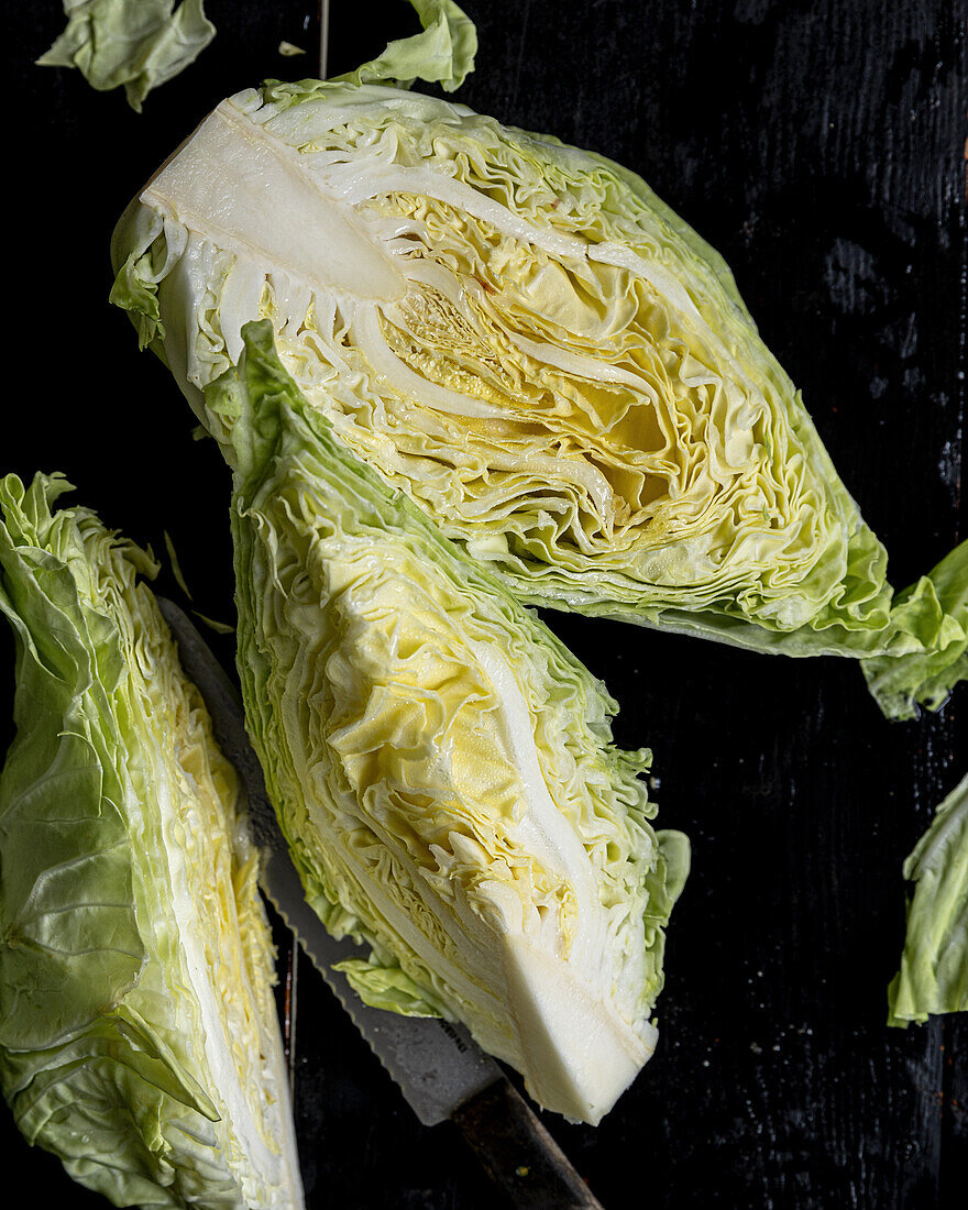 Halved and quartered pointed cabbage