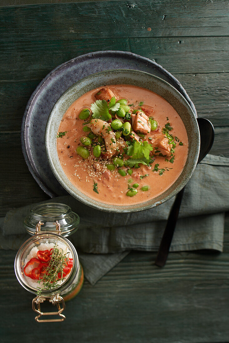Cream of coconut tomato soup with vegetable salt