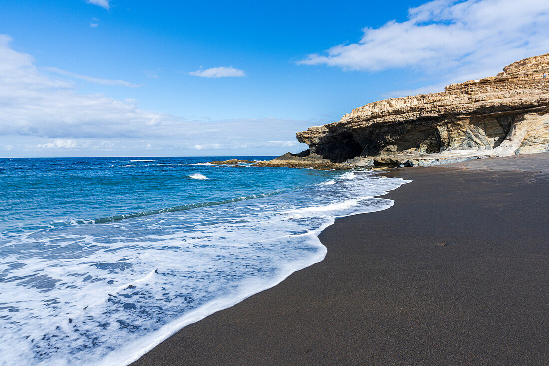 Waves crashing on cliffs at Ajuy volcanic beach, Fuerteventura, Canary Islands, Spain, Atlantic, Europe