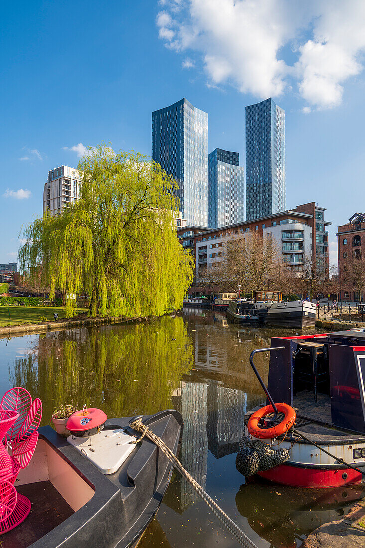 Skyscrapers reflected at Castlefield Basin, Manchester, England, United Kingdom, Europe