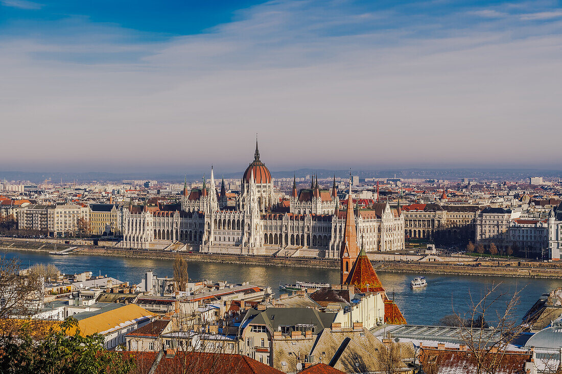 Panoramic day view of neo-Gothic style Orszaghaz Parliament complex landmark on the bank of River Danube, UNESCO World Heritage Site, Budapest, Hungary, Europe