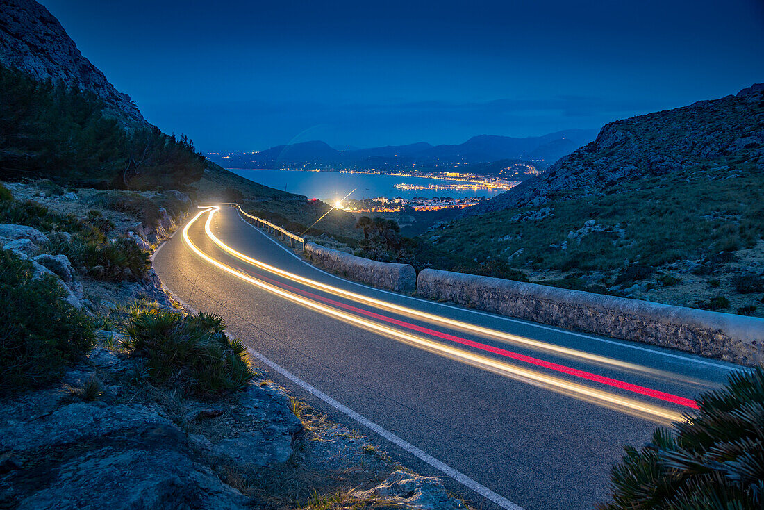 View of trail lights on road to Port de Pollenca at Mirador Es Colomer, Pollenca, Majorca, Balearic Islands, Spain, Mediterranean, Europe