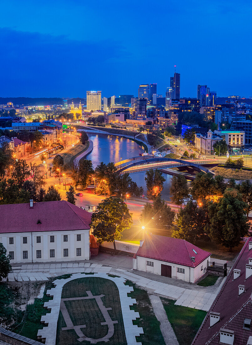 View over Neris River towards Snipiskes, New City Centre, dusk, Vilnius, Lithuania, Europe