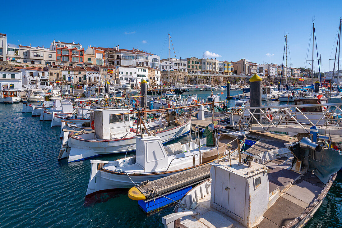 View of boats in marina overlooked by whitewashed houses, Ciutadella, Menorca, Balearic Islands, Spain, Mediterranean, Europe