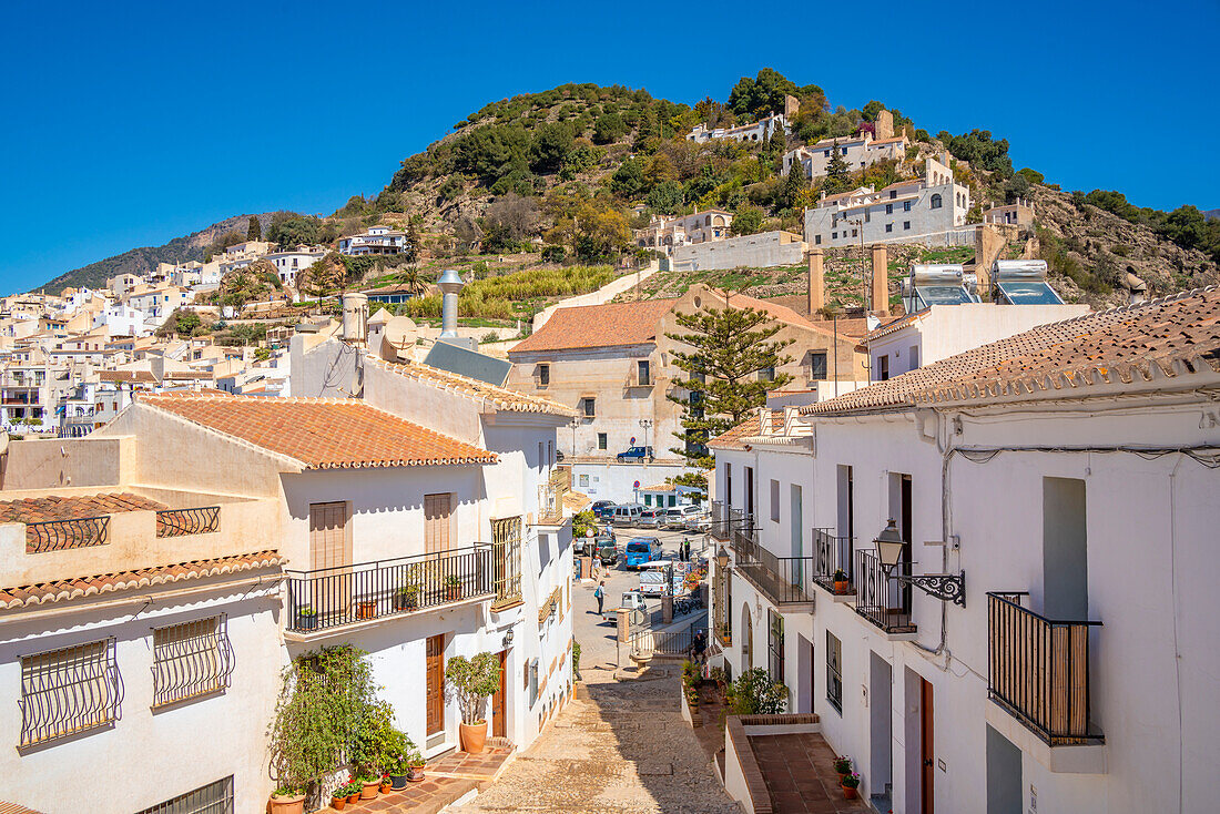 View of whitewashed houses and mountains in background, Frigiliana, Malaga Province, Andalucia, Spain, Mediterranean, Europe