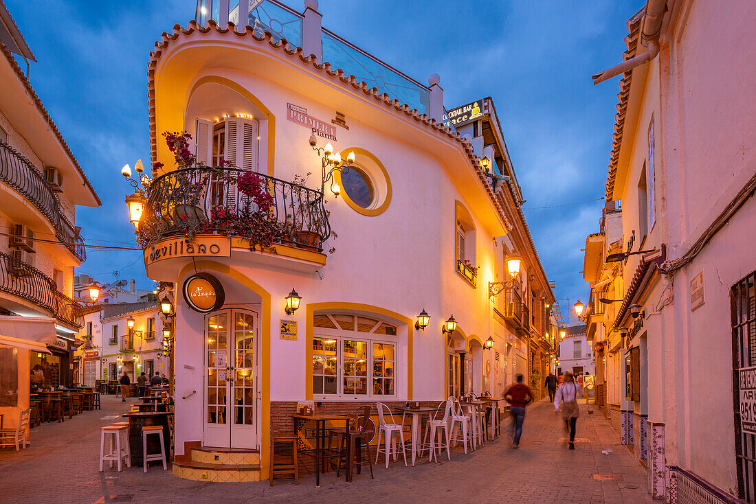 View of cafe and restaurant in the old town of Nerja at dusk, Nerja, Costa del Sol, Malaga Province, Andalusia, Spain, Mediterranean, Europe