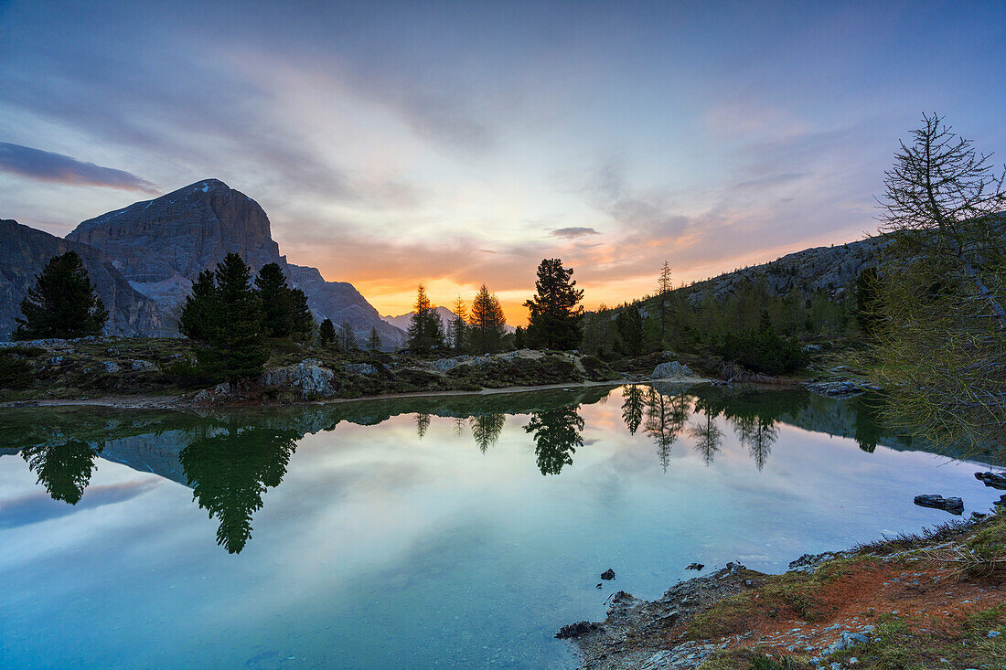 Pristine Lake Limides at dawn with Tofana di Rozes in background, Dolomites, Cortina d'Ampezzo, Belluno province, Veneto, Italy, Europe