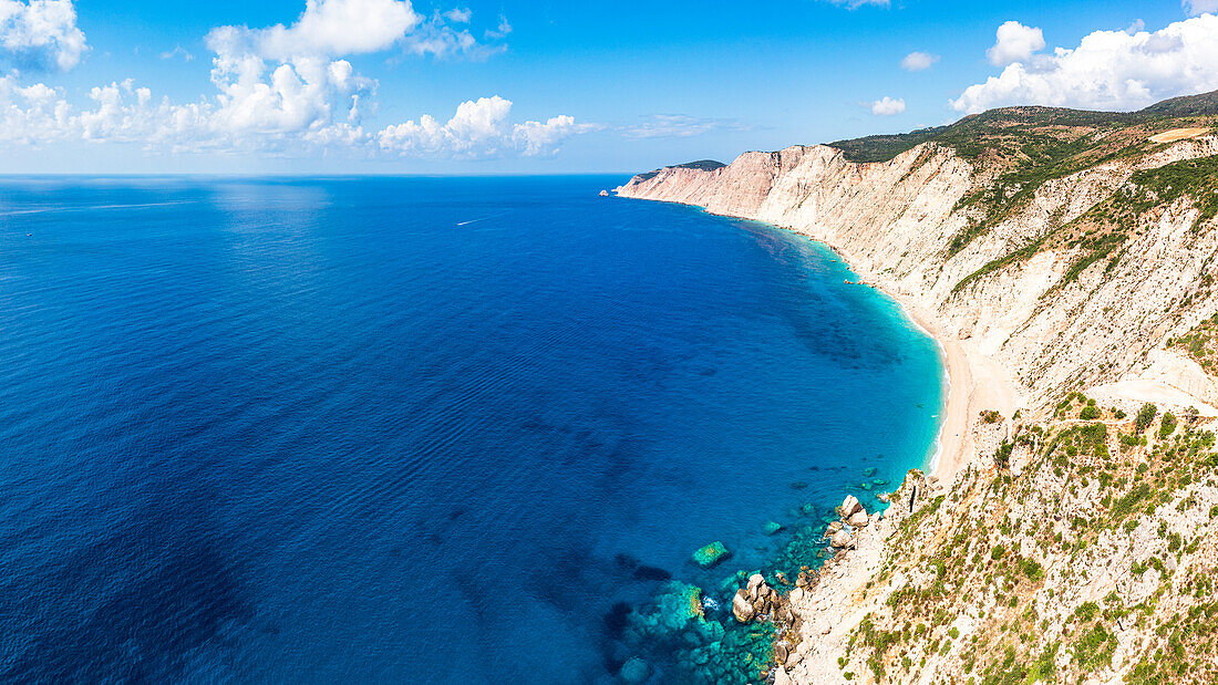 Fine sand of Ammos beach and cliffs washed by the crystal turquoise sea, overhead view, Kefalonia, Ionian Islands, Greek Islands, Greece, Europe