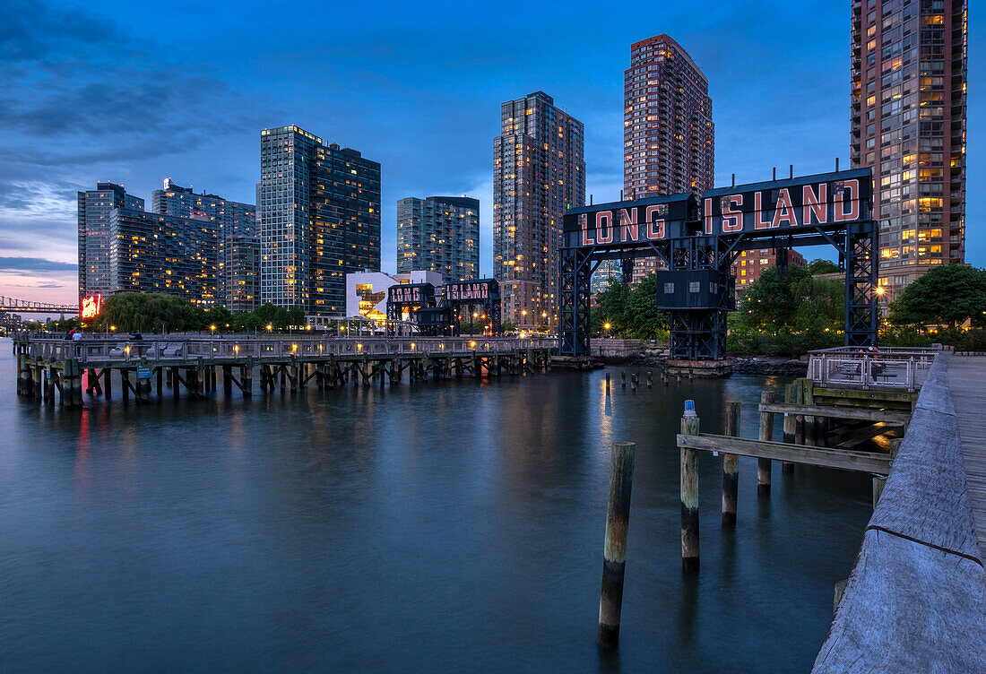 Gantry Plaza State Park at night with Long Island restored Gantries, Long Island City, New York, United States of America, North America