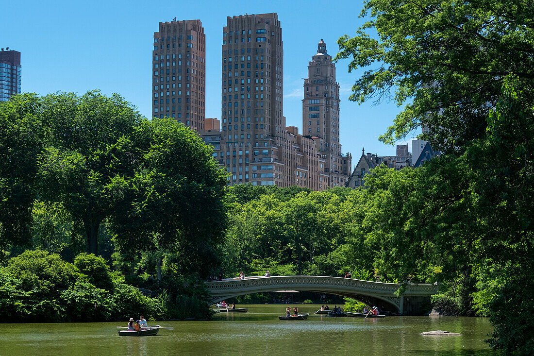 The Majestic Apartments Building on Central Park West, above Central Park Lake and Bow Bridge, Manhattan, New York, United States of America, North America