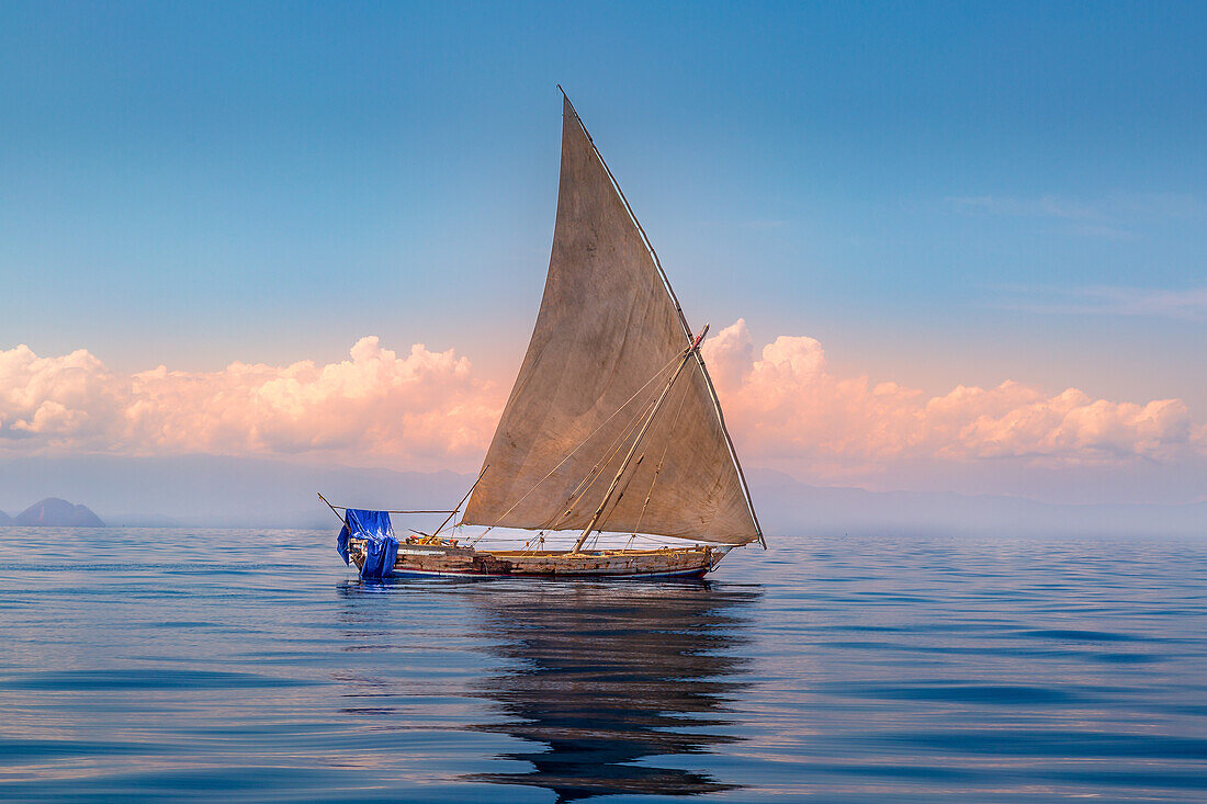Traditional wooden sailing vessel at sea off the North West coast of Madagascar, Indian Ocean, Africa
