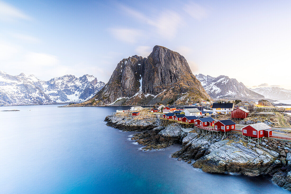 High angle view of traditional red Rorbu cabins in the fishing village of Hamnoy at dawn, Reine, Lofoten Islands, Norway, Europe