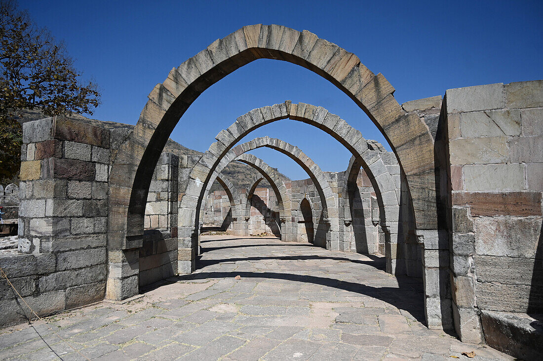 Five arches, the remains of 15th century hilltop Saat Kaman (Seven Arches) monument, part of the Champaner complex, Gujarat, India, Asia