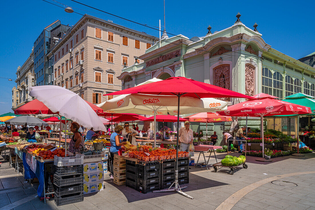 View of fruit and vegetable stall and exterior of ornate Central Market building, Rijeka, Croatia, Europe