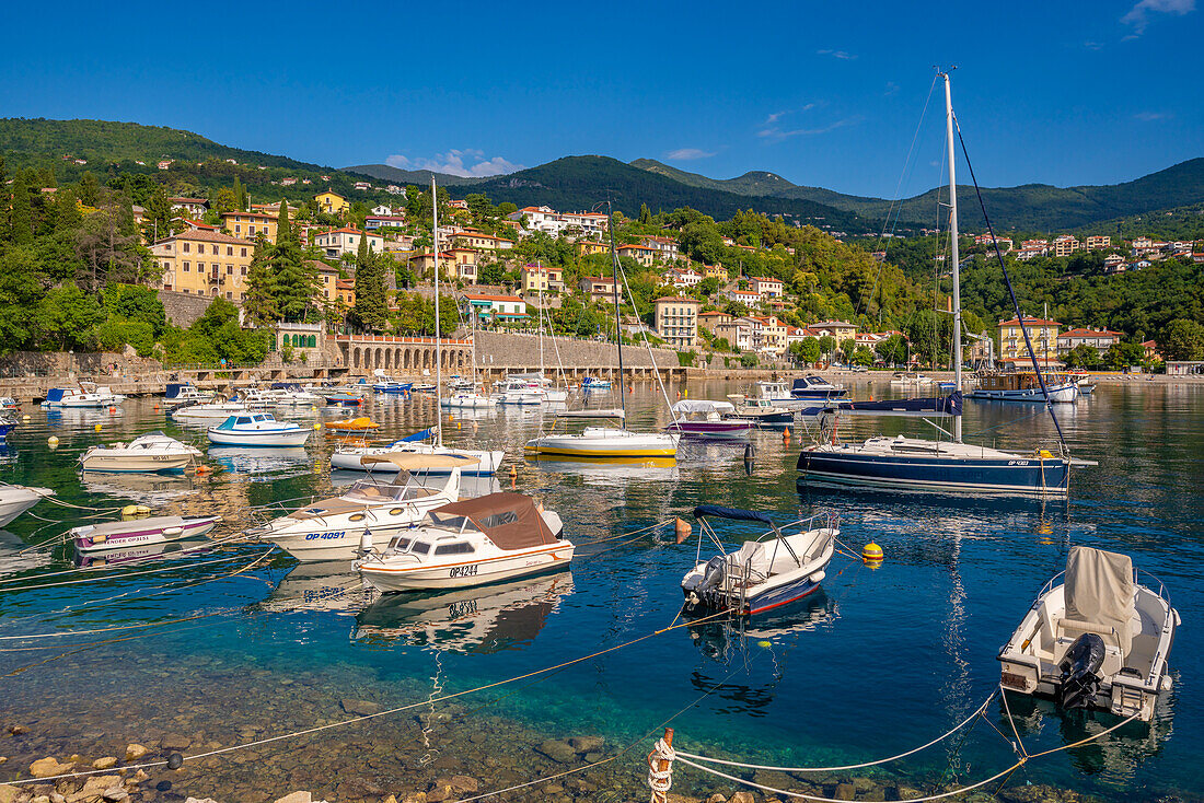 View of boats in the bay at Ika, Kvarner Bay, Eastern Istria, Croatia, Europe