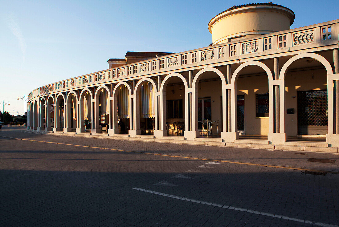 The portico in Piazza di Saint Apollinare, Tresigallo, Ferrara Province, Emilia-Romagna, Italy, Europe