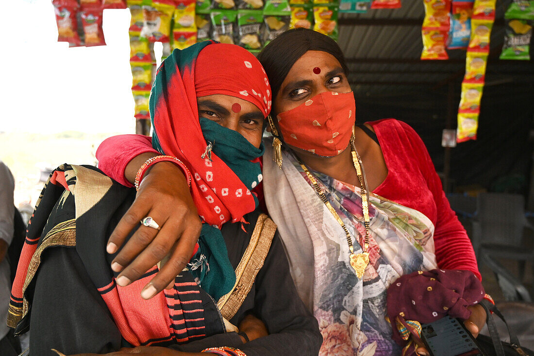 Two hijras, transgender people, good friends, at a roadside dhaba, trying to pick up any work where they can, Bavla, Gujarat, India, Asia