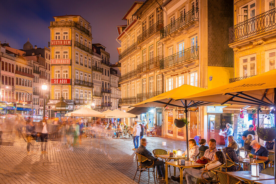 View of cafes in Praca de Almeida Garrett at night, Porto, Norte, Portugal, Europe