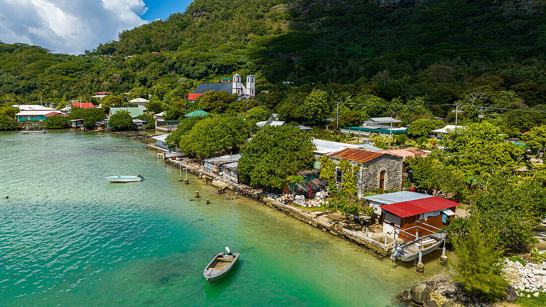 Aerial of Rikitea village, Mangareva, Gambier archipelago, French Polynesia, South Pacific, Pacific