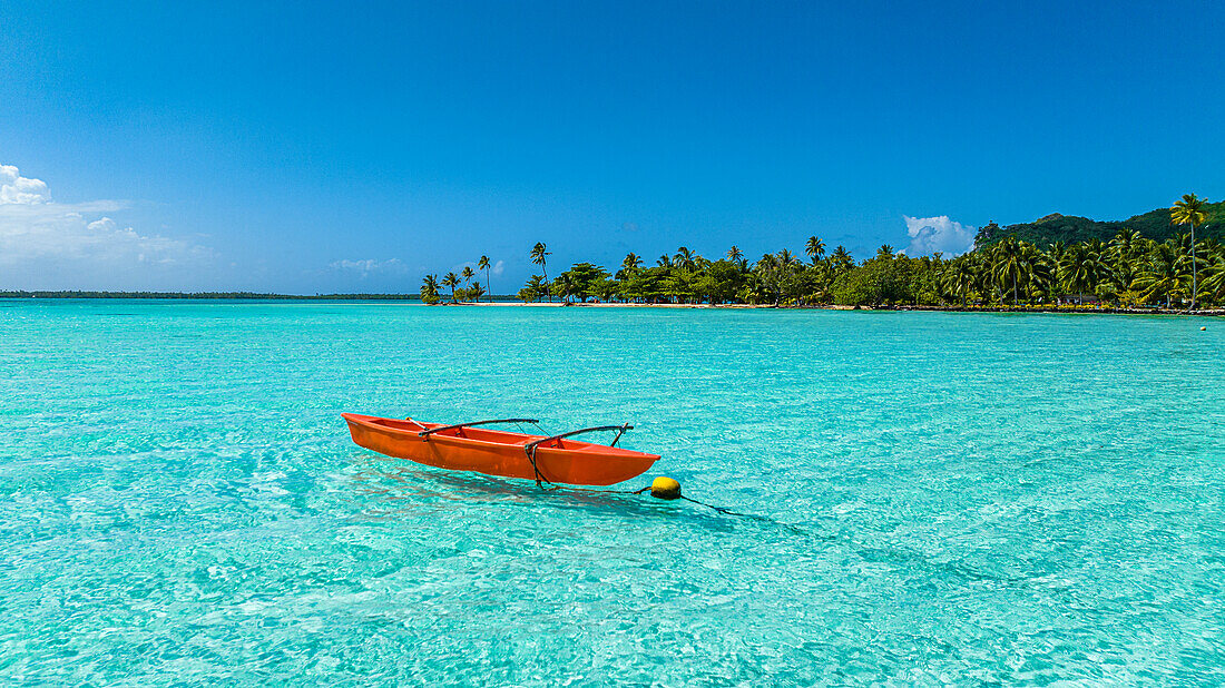 Outrigger canoe in the lagoon of Maupiti, Society Islands, French Polynesia, South Pacific, Pacific