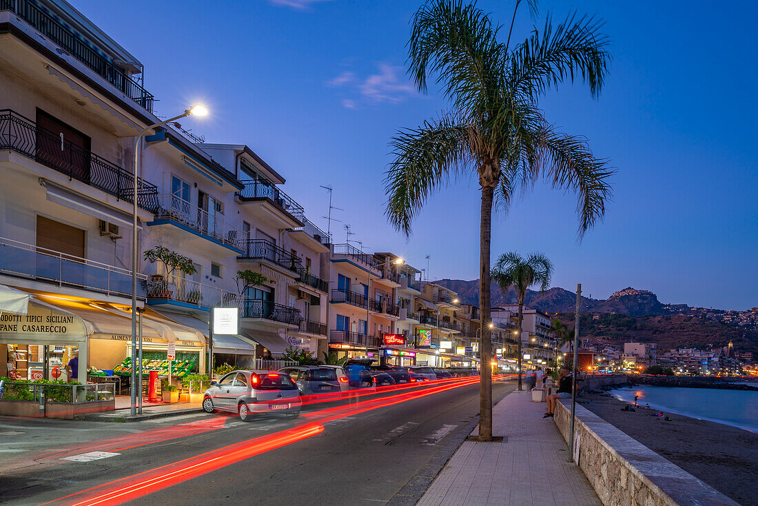 View of Giardini-Naxos promenade at dusk, Province of Messina, Sicily, Italy, Mediterranean, Europe