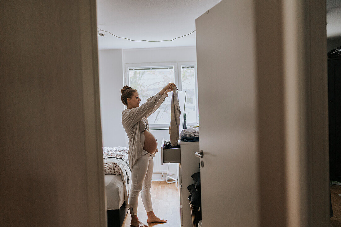 Pregnant woman at home