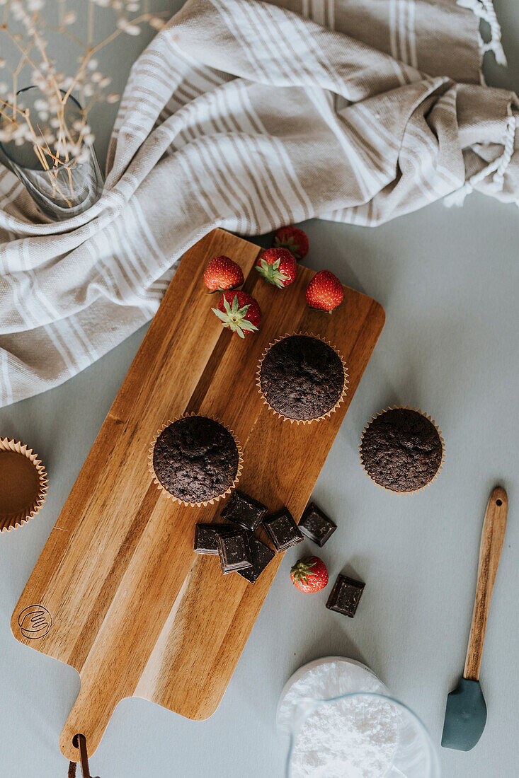 Cupcakes on wooden board