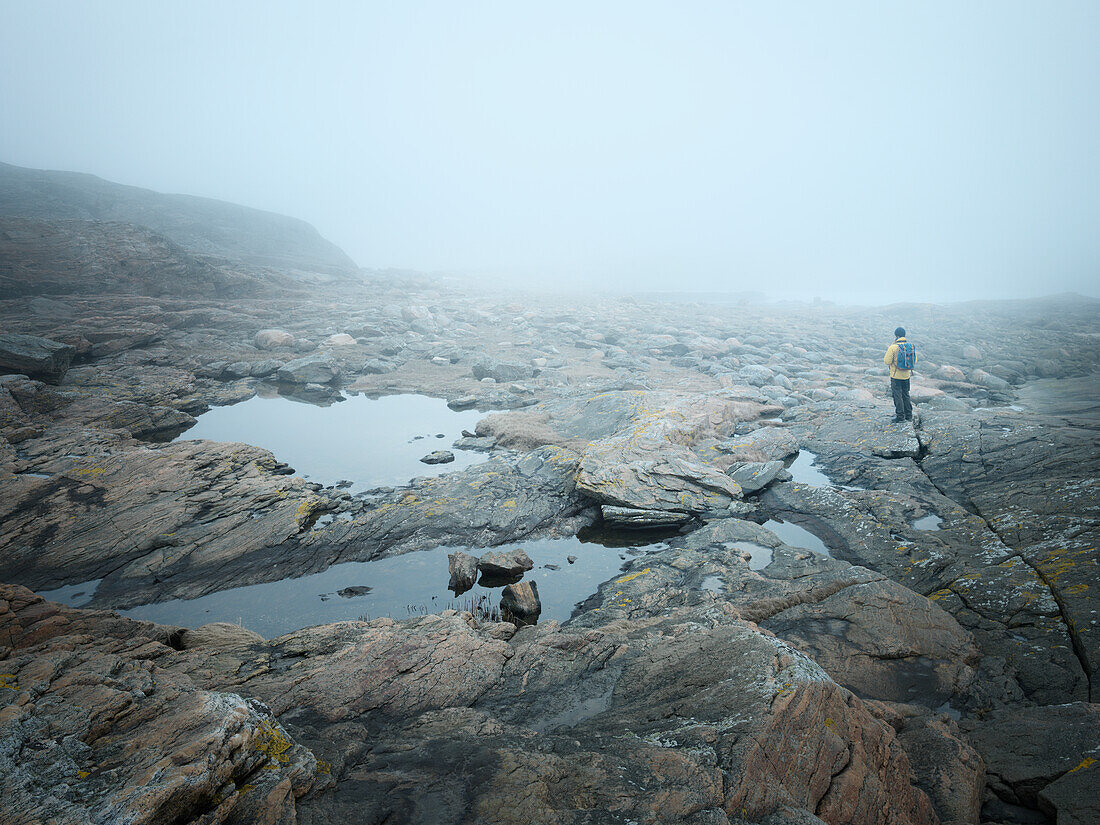 Hiker on rocky landscape