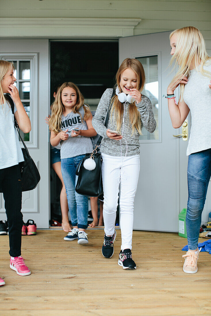 Happy girls walking together