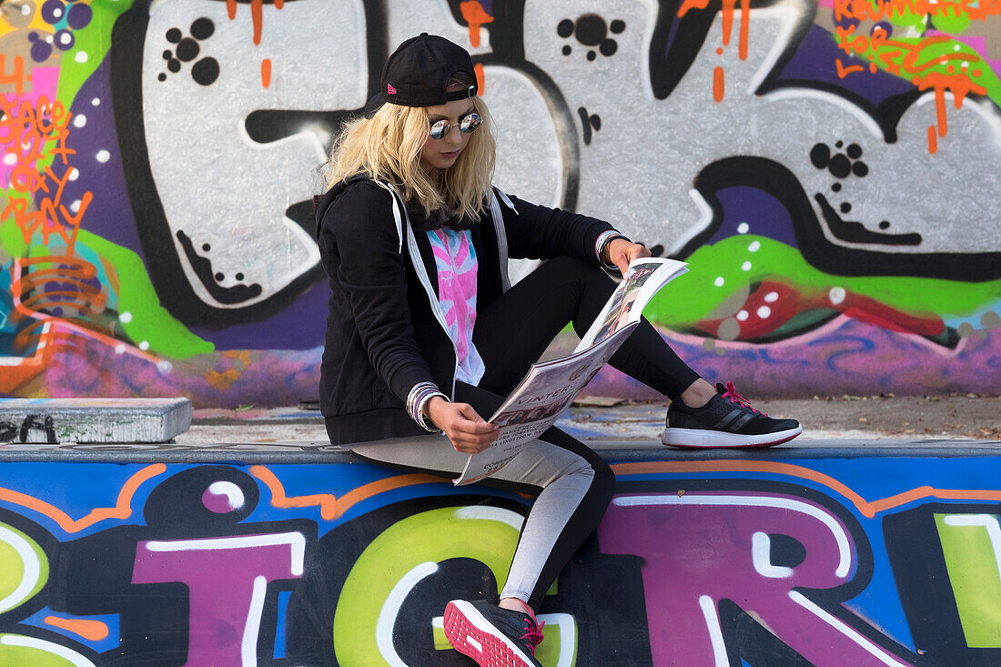 Woman reading newspaper