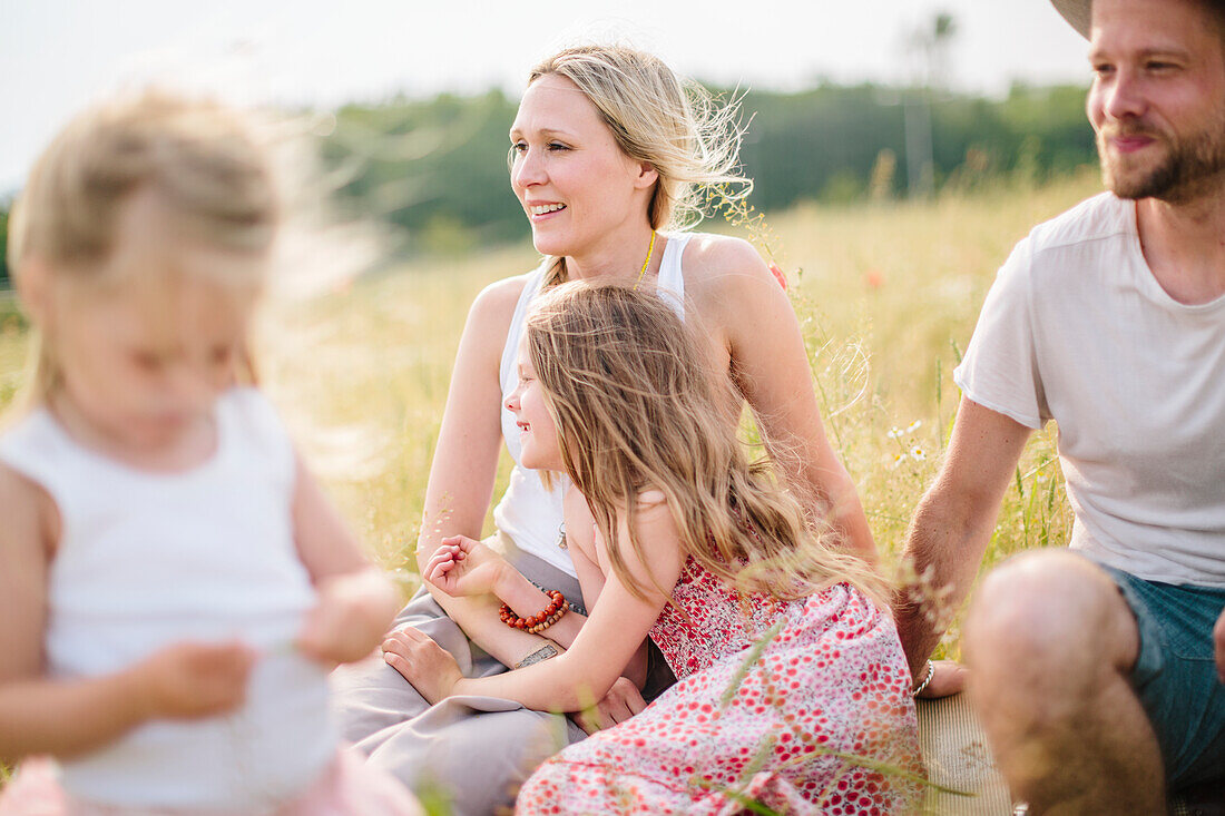 Family in meadow