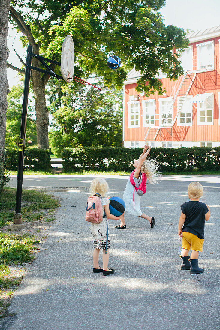 Children playing basketball