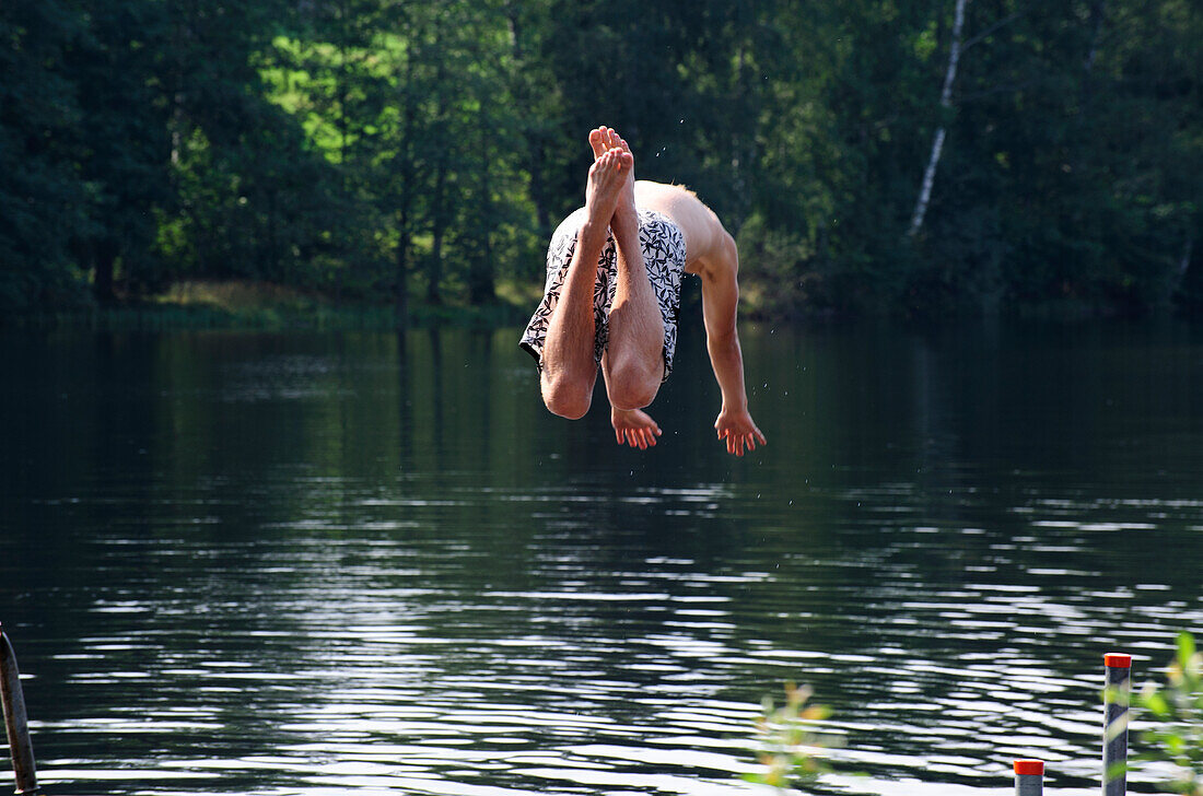 Man jumping in water