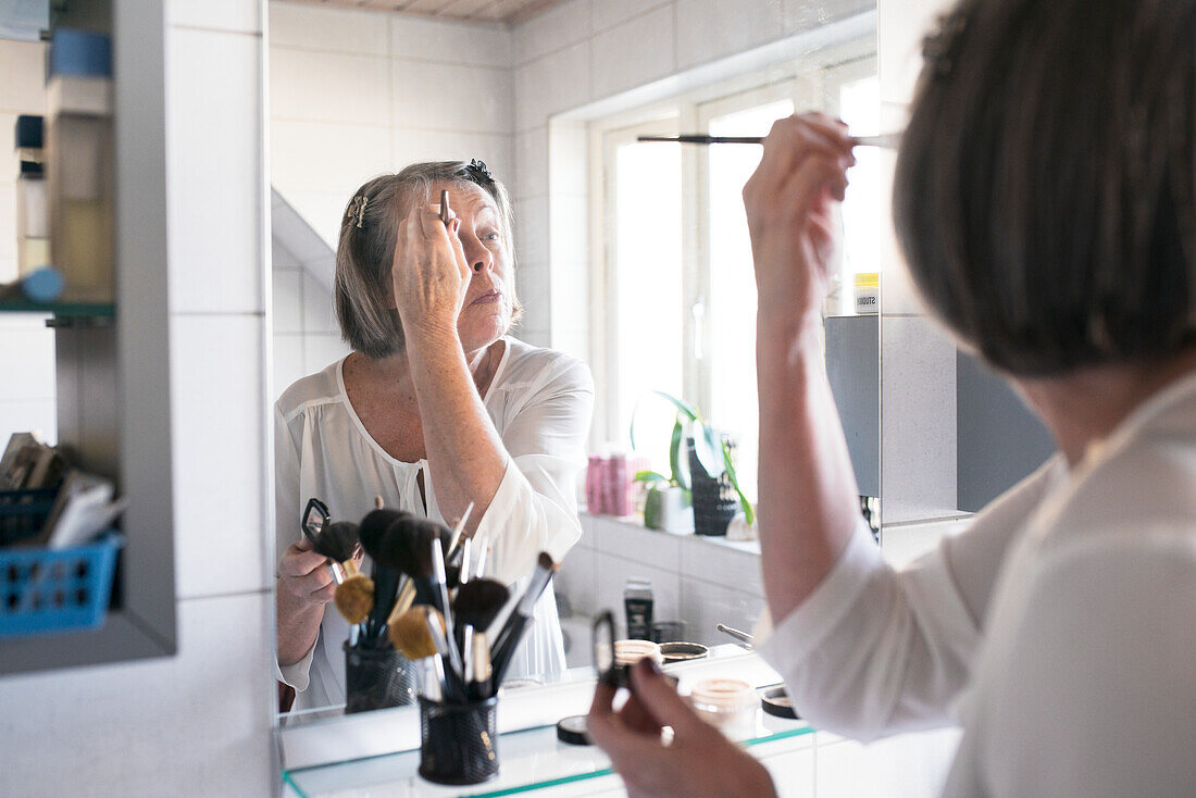 Woman doing make-up