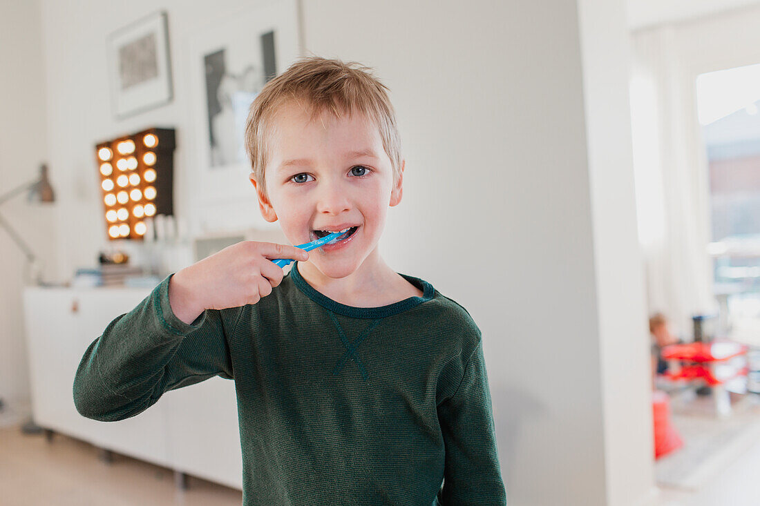 Boy brushing teeth