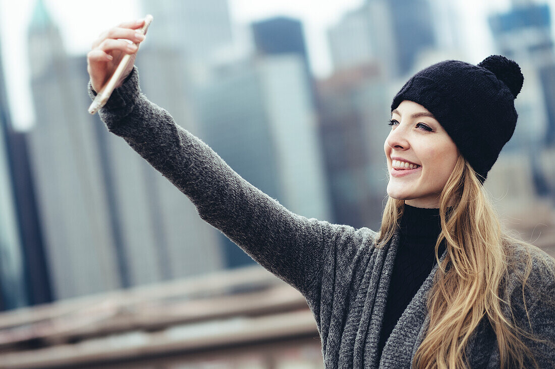 Young woman taking selfie