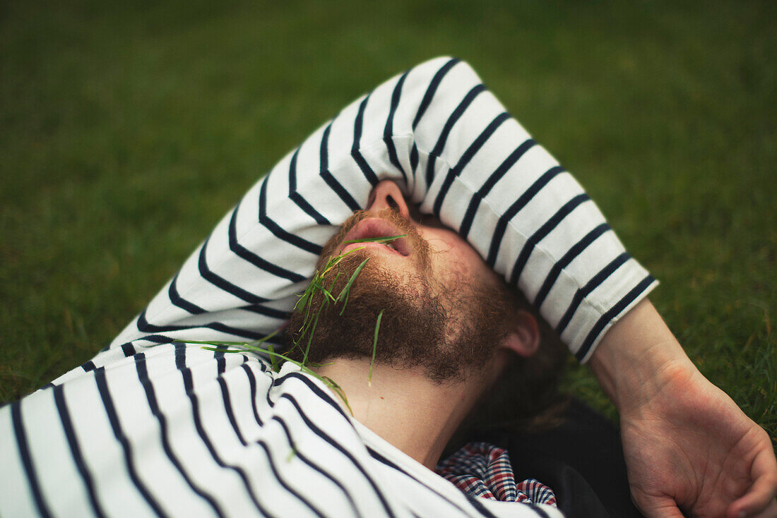 Man relaxing on grass