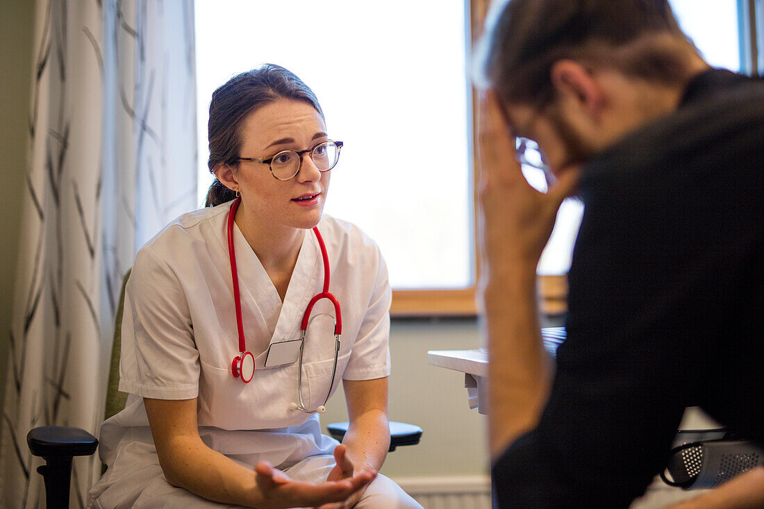 Doctor examining patient