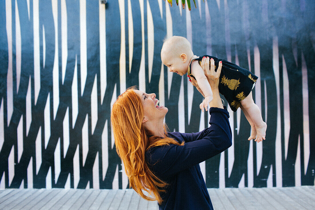 Mother with baby daughter