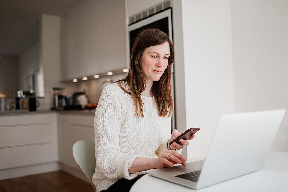 Young woman using laptop