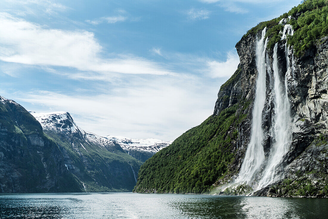 View of waterfall at lake